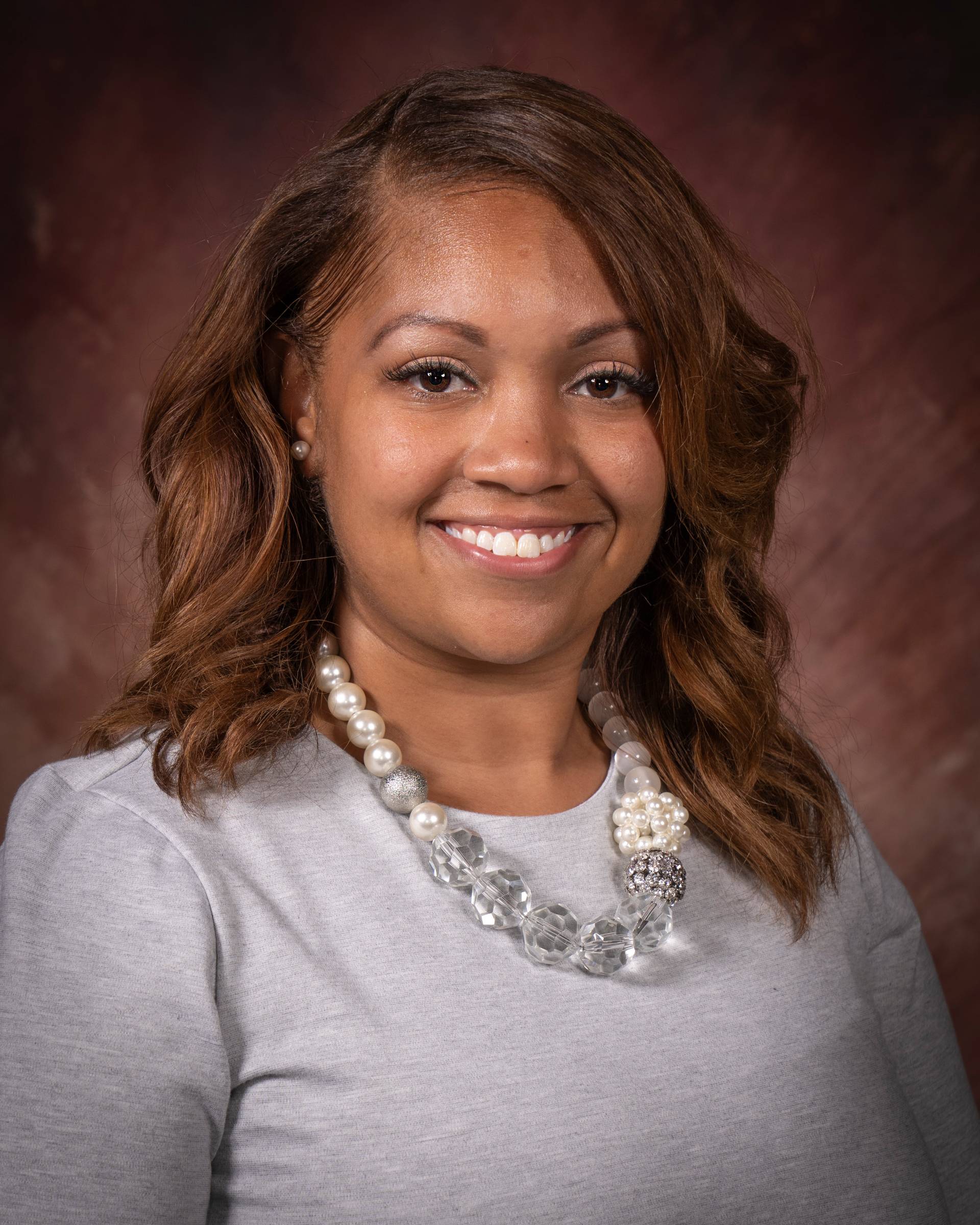 Brittany Devereueawax headshot