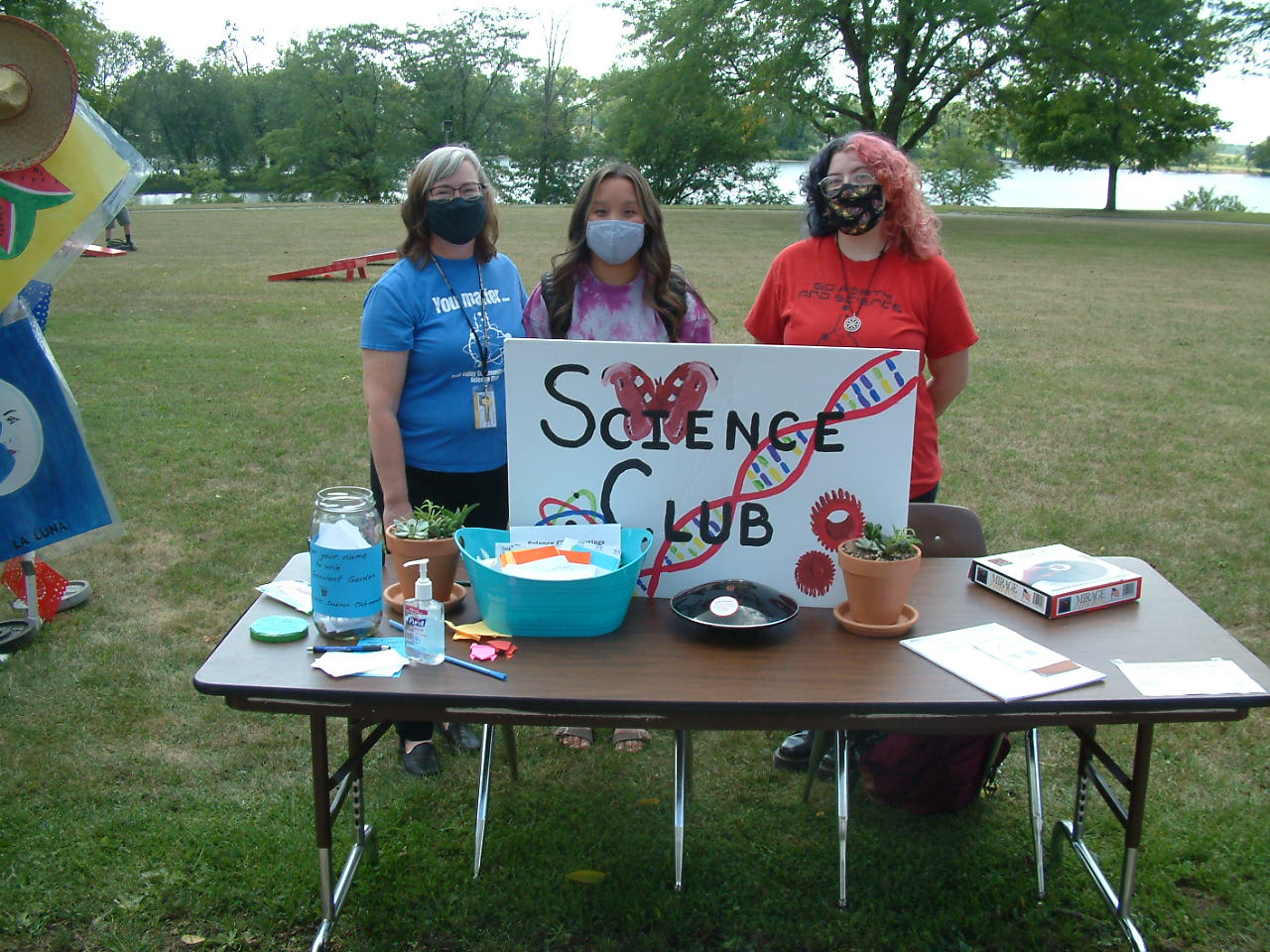 Club-representatives-at-the-Science-Club-booth-from-left-to-right_-Lori-Anton,-Lydia-Anton,-and-Gretchen-Thomas.JPG