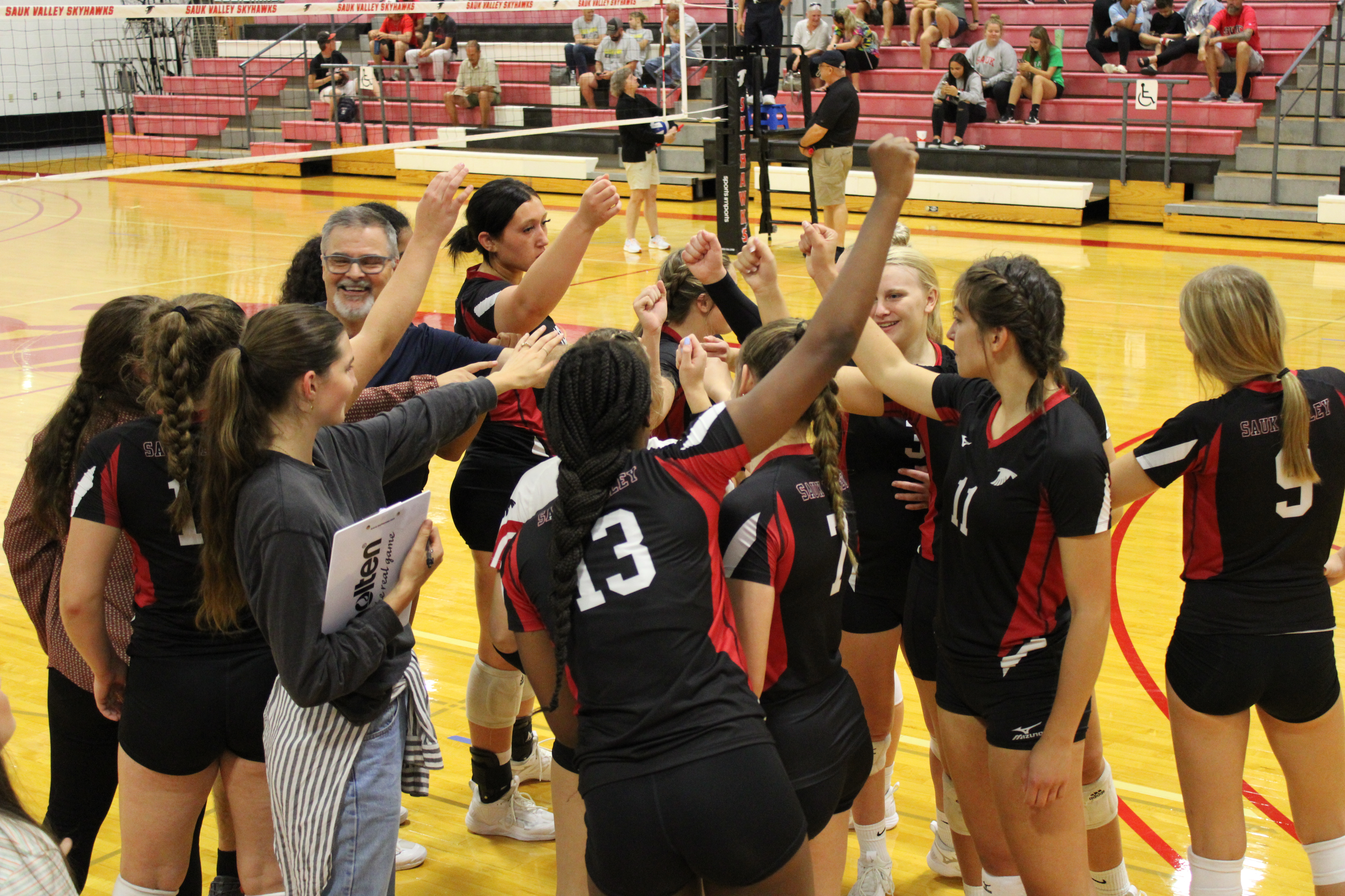The Sauk Valley’s volleyball team displays teamwork after a home game win against Black Hawk College on September 9th, 2022.