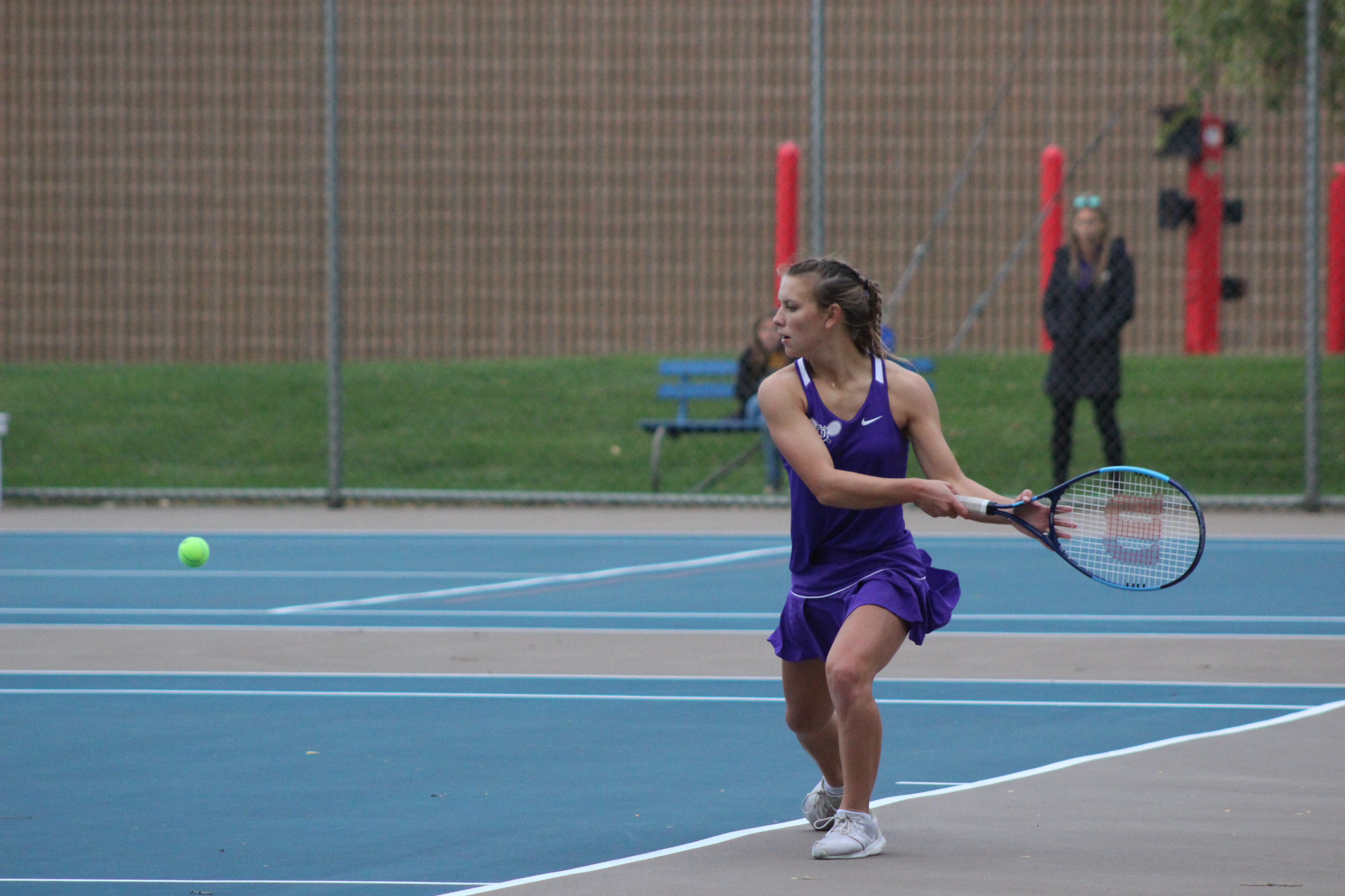 Taylor Harrison Returns a Tennis Ball