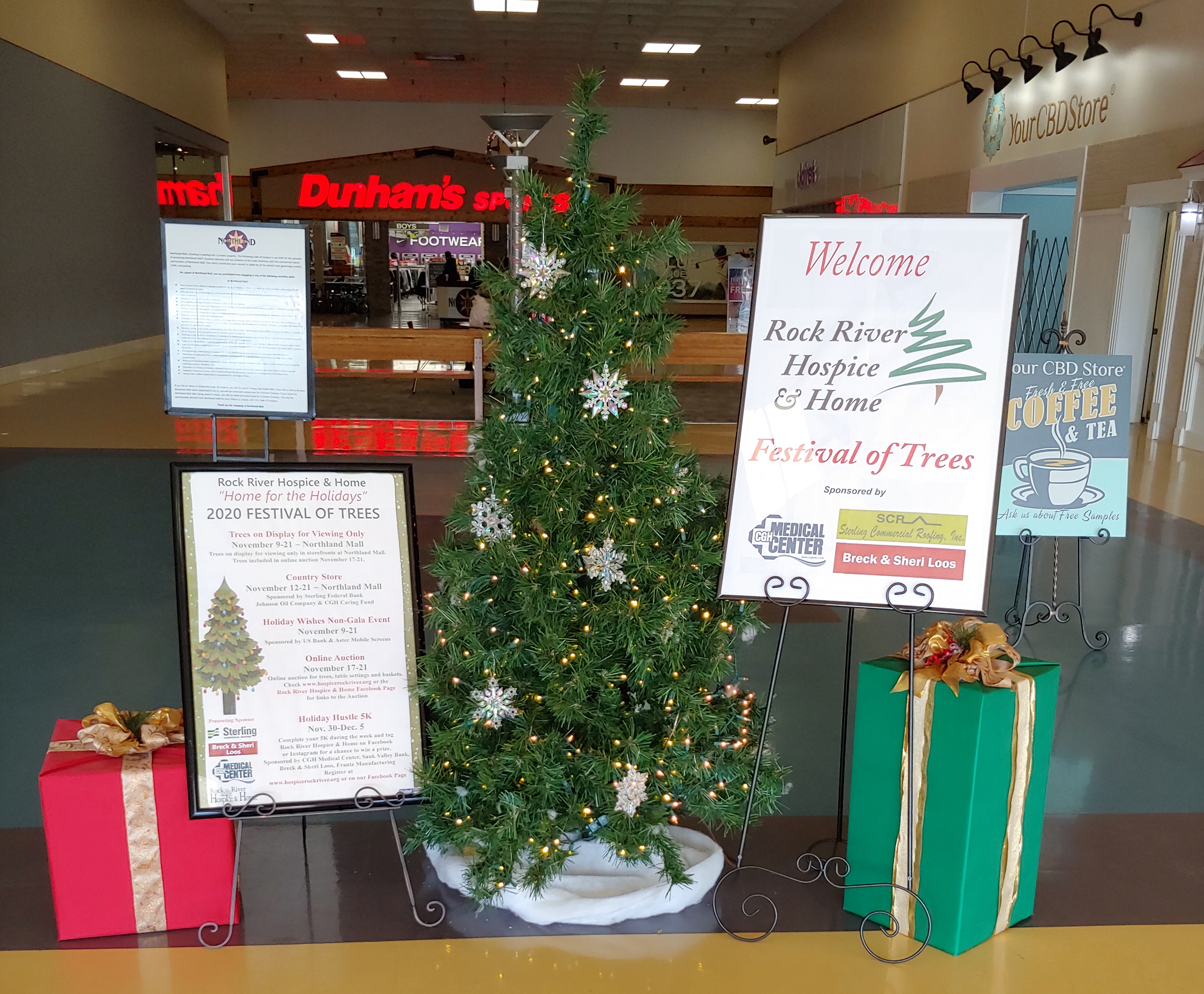 Hospice Posters around a tree in the mall