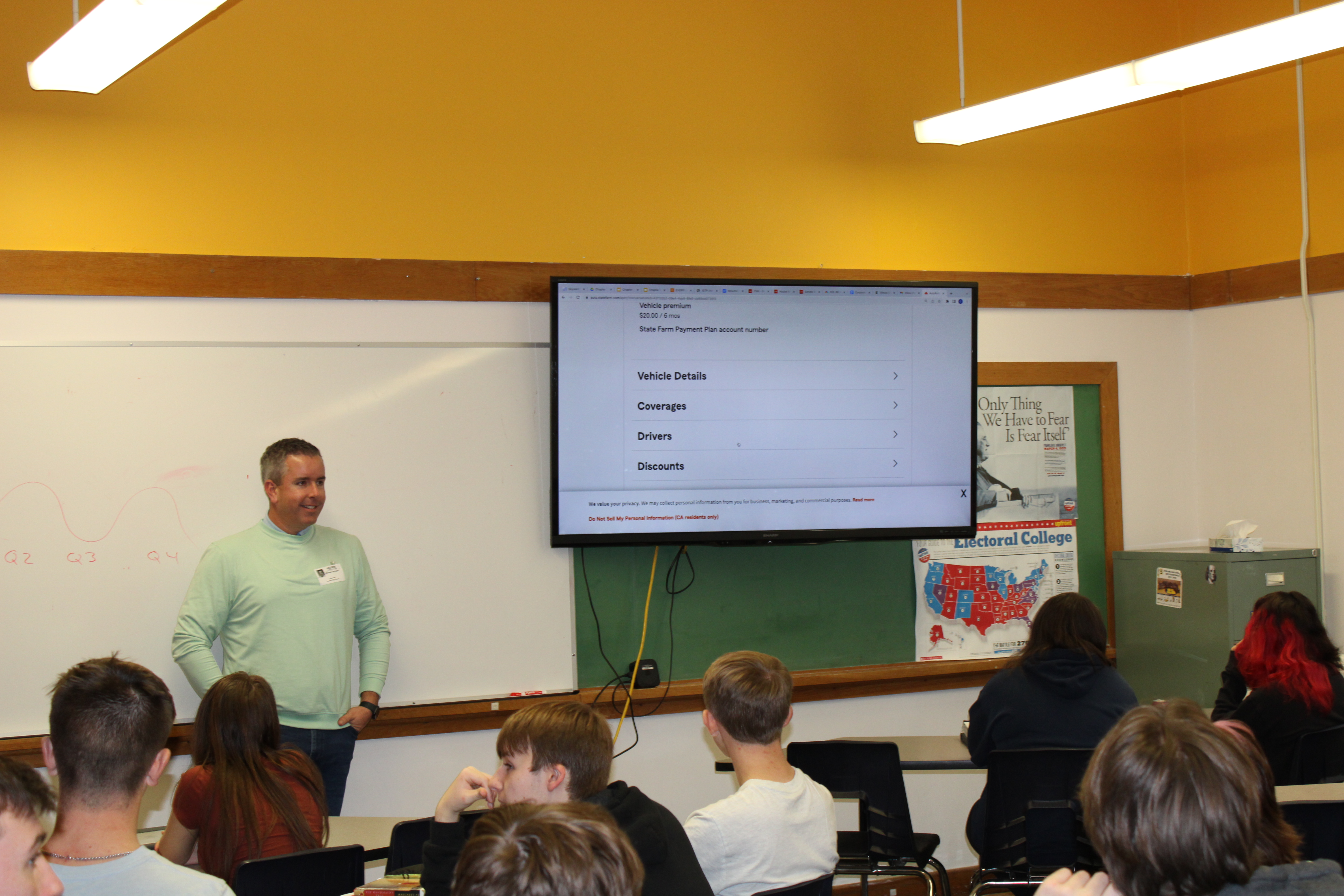 Mike Sprague of State Farm Insurance speaks to Sterling seniors of the Adulting 101 class
