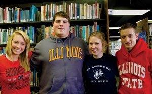 Four students wearing shirts from 4-year colleges